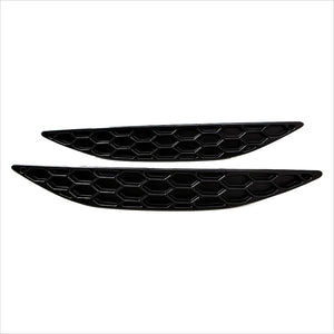 A set of gloss black Acexxon Honeycomb Rear Reflector Inserts for the VW MK7 Golf R