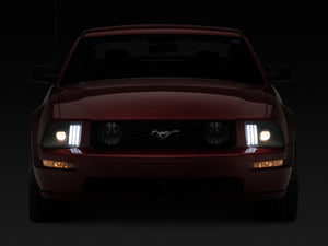 Raxiom 05-09 Ford Mustang w/ Halogen Prjctor Headlights- Black Housing (Clear Lens) (No GT500 )