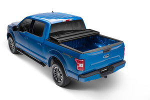 Lund 09-17 Dodge Ram 1500 Fleetside (5.7ft. Bed) Hard Fold Tonneau Cover - Black