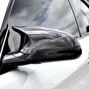 AutoTecknic Carbon Fiber Mirror Covers on a white BMW