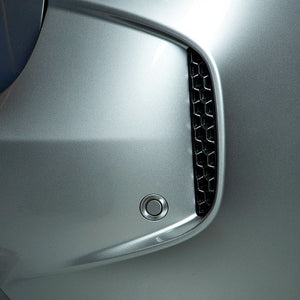 Close up of a matte black Acexxon Honeycomb Rear Reflector Inserts on a BMW F85 X5M 